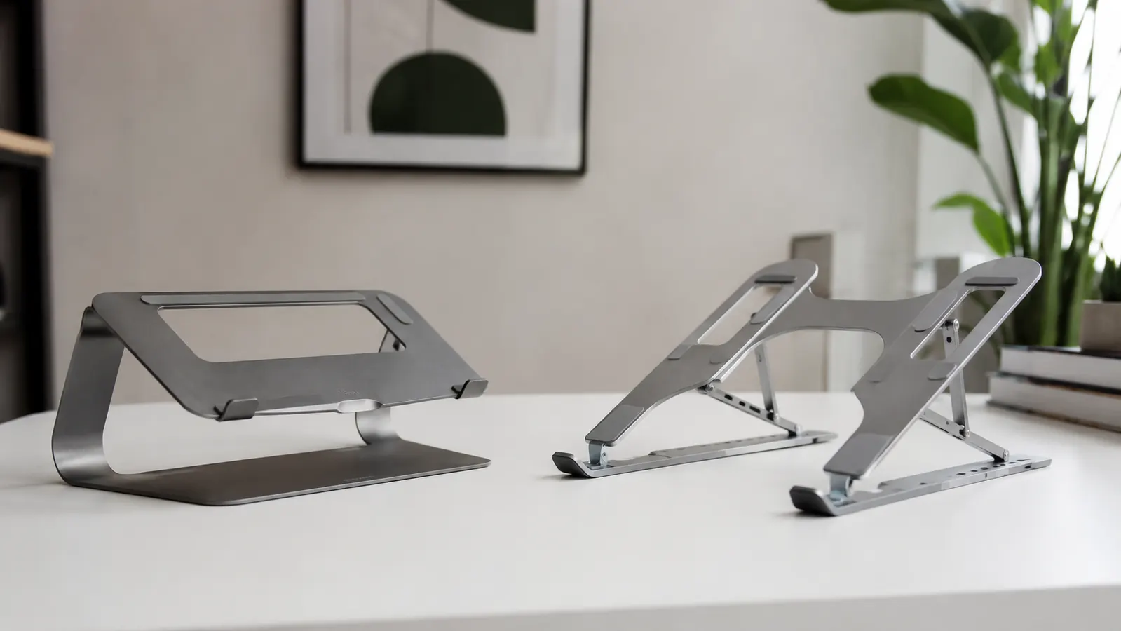 Lamicall aluminum laptop stand on a clean home office desk with a MacBook elevated to eye level, external keyboard in front